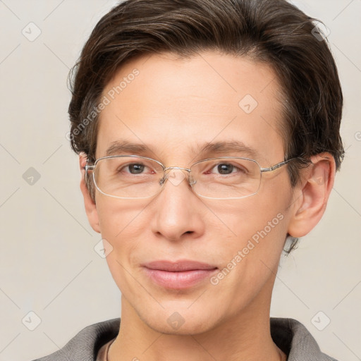 Joyful white adult male with short  brown hair and grey eyes