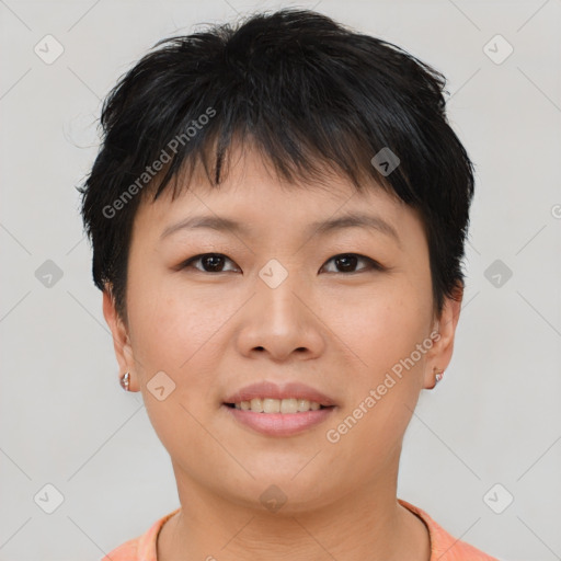 Joyful asian young-adult female with short  brown hair and brown eyes