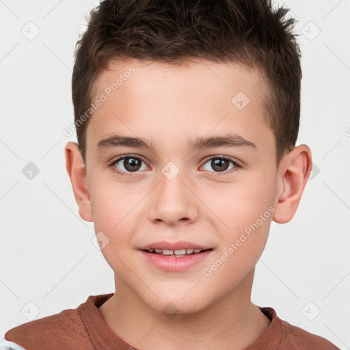 Joyful white child male with short  brown hair and brown eyes