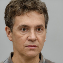 Neutral white adult male with short  brown hair and brown eyes