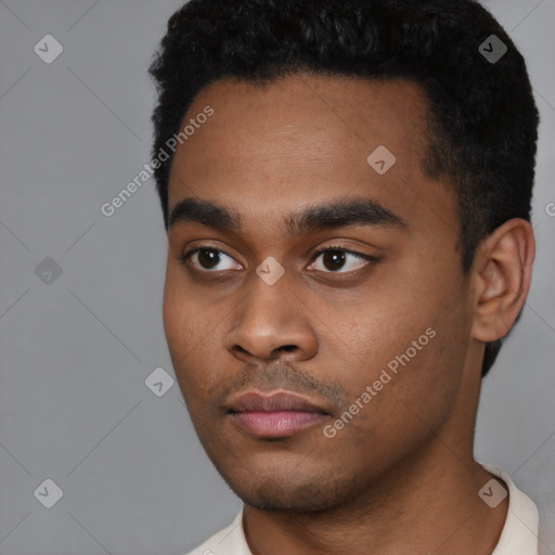 Neutral black young-adult male with short  black hair and brown eyes