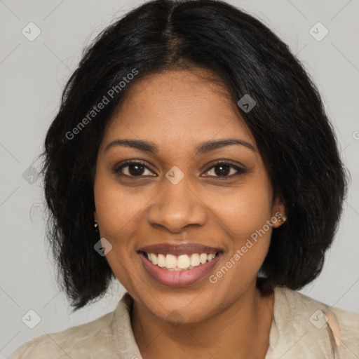 Joyful black young-adult female with medium  black hair and brown eyes