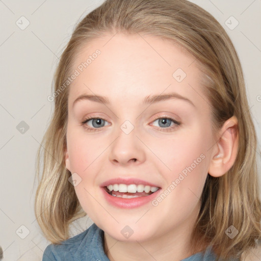 Joyful white young-adult female with medium  brown hair and blue eyes