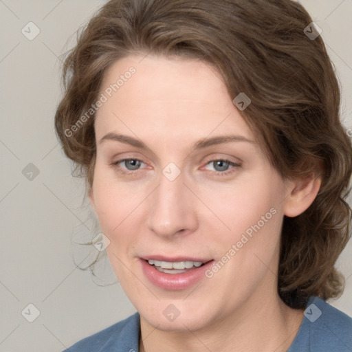 Joyful white young-adult female with medium  brown hair and blue eyes