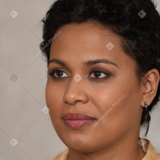 Joyful black young-adult female with medium  brown hair and brown eyes