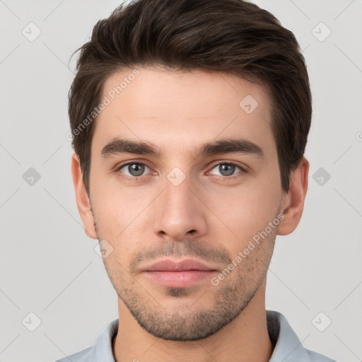 Neutral white young-adult male with short  brown hair and brown eyes