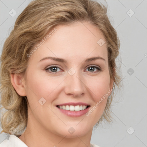 Joyful white young-adult female with medium  brown hair and blue eyes