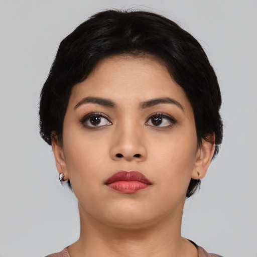 Neutral asian young-adult female with short  black hair and brown eyes