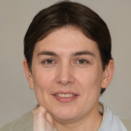 Joyful white adult female with short  brown hair and brown eyes