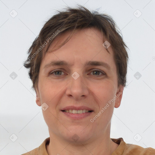 Joyful white adult female with short  brown hair and brown eyes