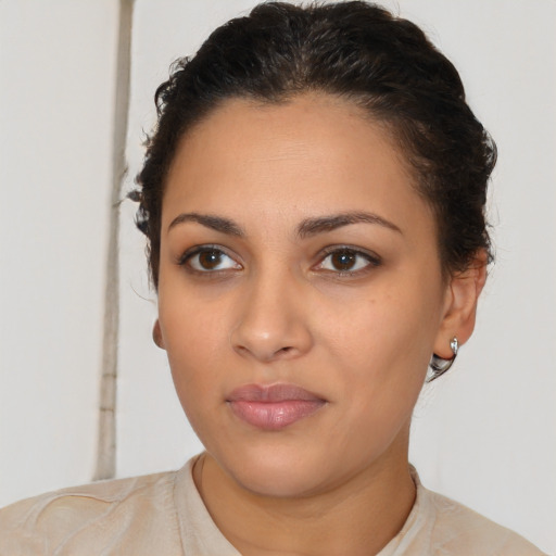 Neutral latino young-adult female with short  brown hair and brown eyes