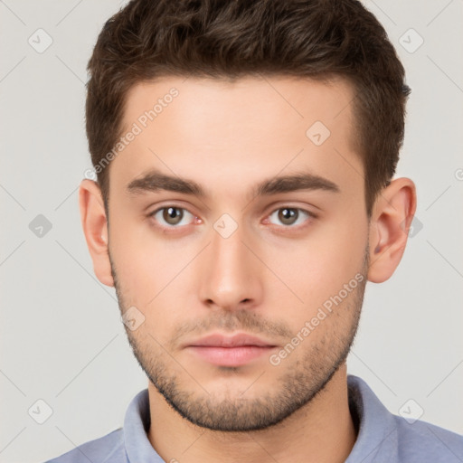 Neutral white young-adult male with short  brown hair and brown eyes