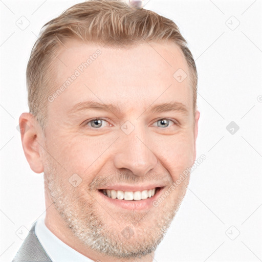 Joyful white adult male with short  brown hair and grey eyes