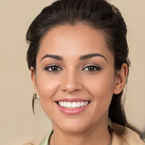 Joyful white young-adult female with long  brown hair and brown eyes