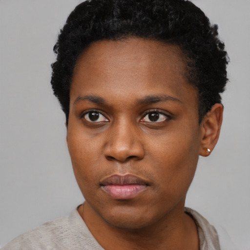 Neutral black young-adult female with short  black hair and brown eyes