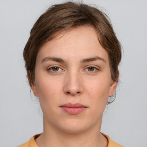 Neutral white young-adult female with short  brown hair and brown eyes