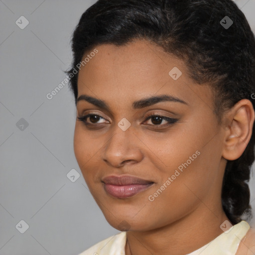 Joyful latino young-adult female with medium  black hair and brown eyes