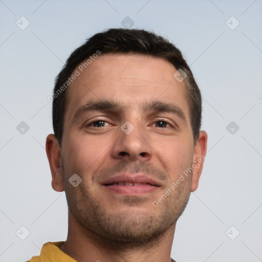 Joyful white young-adult male with short  brown hair and brown eyes