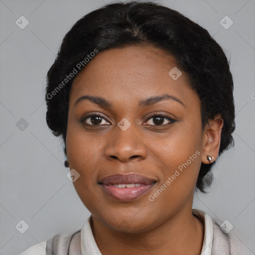 Joyful black young-adult female with medium  black hair and brown eyes