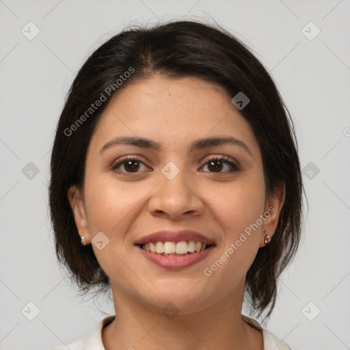 Joyful latino young-adult female with medium  brown hair and brown eyes