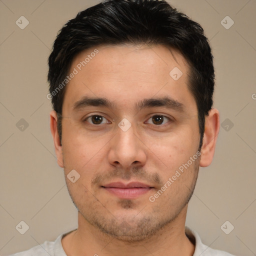 Joyful white young-adult male with short  black hair and brown eyes