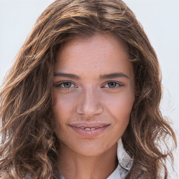 Joyful white young-adult female with long  brown hair and green eyes