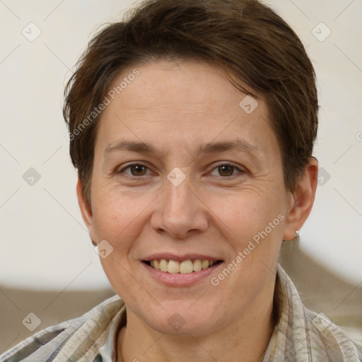 Joyful white adult female with short  brown hair and brown eyes