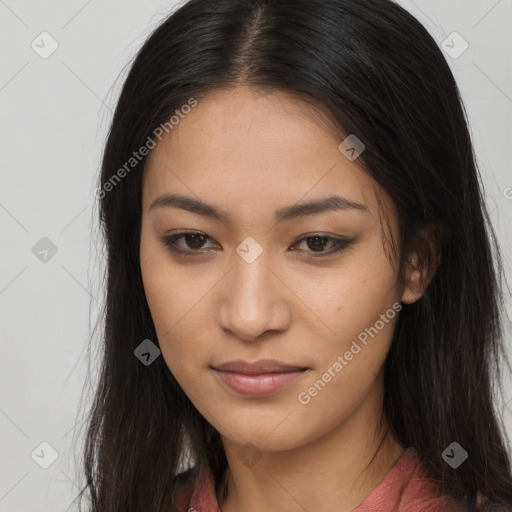 Joyful latino young-adult female with long  brown hair and brown eyes