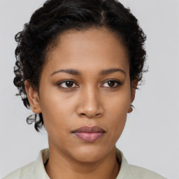 Neutral black young-adult female with short  brown hair and brown eyes