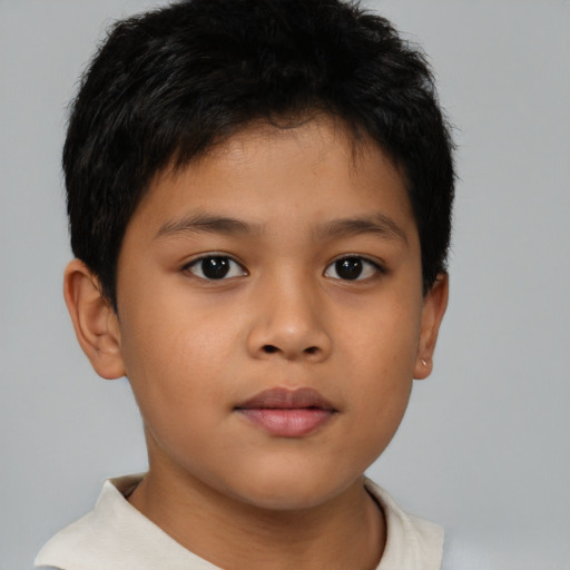 Neutral asian child male with short  brown hair and brown eyes