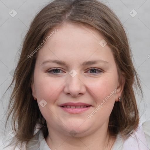 Joyful white young-adult female with medium  brown hair and blue eyes