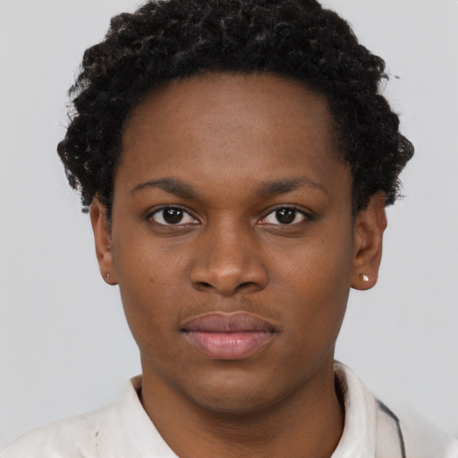 Neutral black young-adult female with short  brown hair and brown eyes