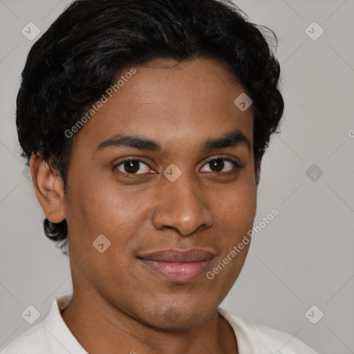 Joyful latino young-adult male with short  brown hair and brown eyes
