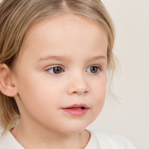 Neutral white child female with medium  brown hair and brown eyes