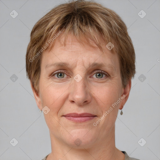 Joyful white adult female with short  brown hair and grey eyes