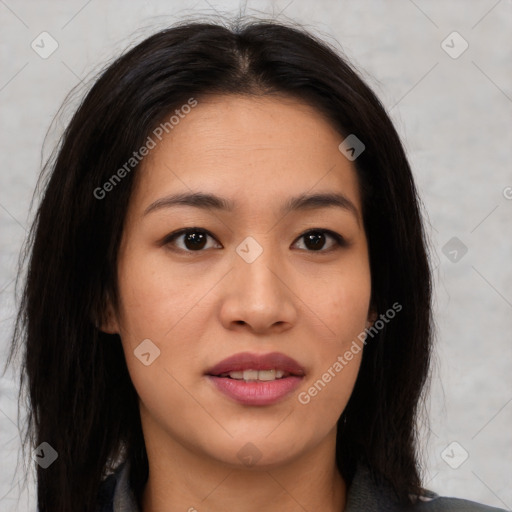 Joyful asian young-adult female with long  brown hair and brown eyes