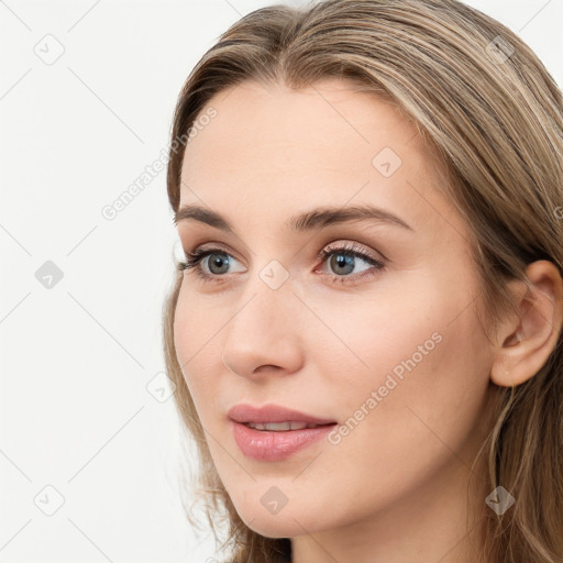 Neutral white young-adult female with long  brown hair and blue eyes