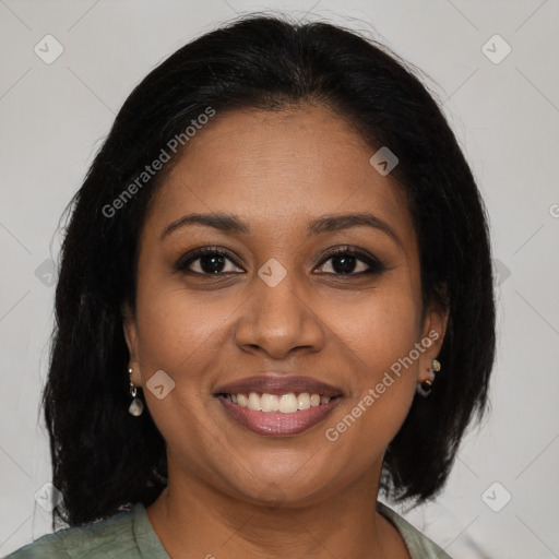 Joyful black young-adult female with medium  brown hair and brown eyes