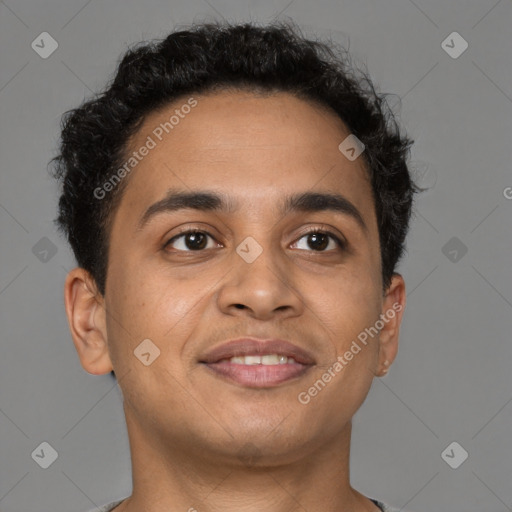 Joyful latino young-adult male with short  brown hair and brown eyes