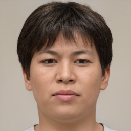 Neutral asian young-adult male with short  brown hair and brown eyes