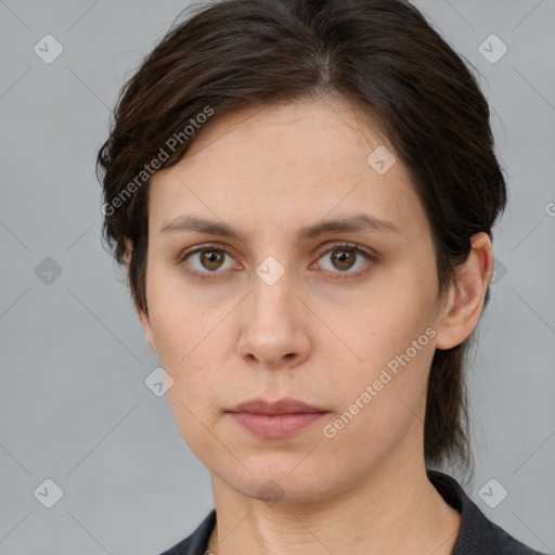 Neutral white young-adult female with medium  brown hair and brown eyes