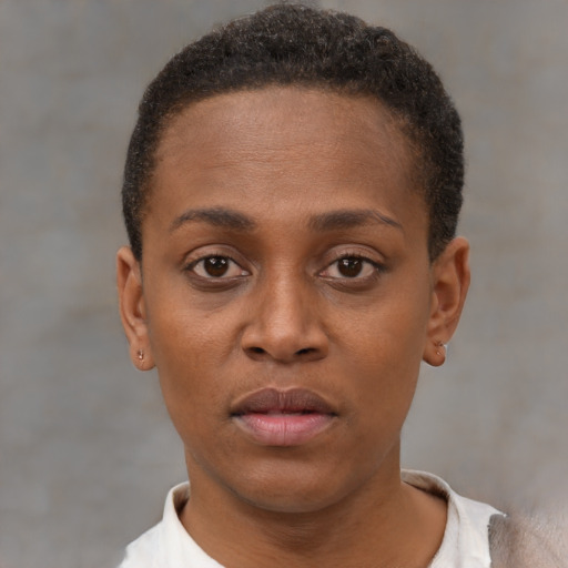 Neutral black young-adult female with short  brown hair and brown eyes