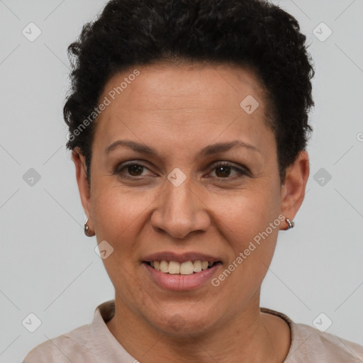 Joyful black adult female with short  brown hair and brown eyes