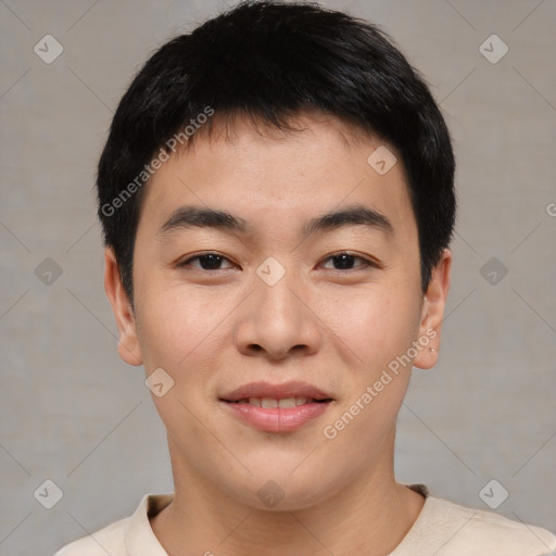 Joyful asian young-adult male with short  black hair and brown eyes