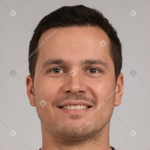 Joyful white young-adult male with short  brown hair and brown eyes