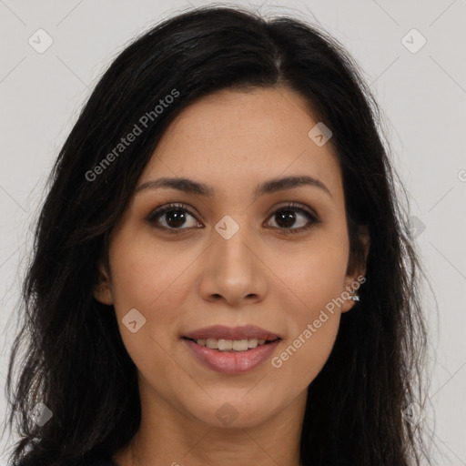 Joyful asian young-adult female with long  brown hair and brown eyes