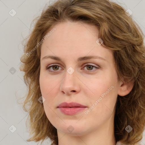 Joyful white young-adult female with medium  brown hair and green eyes