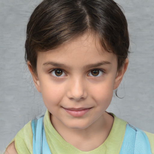 Joyful white child female with medium  brown hair and brown eyes