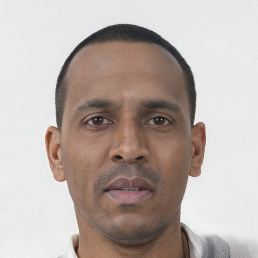 Neutral black young-adult male with short  black hair and brown eyes