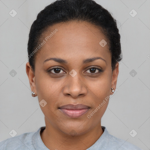 Joyful black young-adult female with short  brown hair and brown eyes